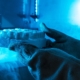 Side view of a person in gloves handling dry ice